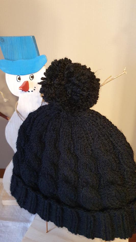 Mütze mit Bommel